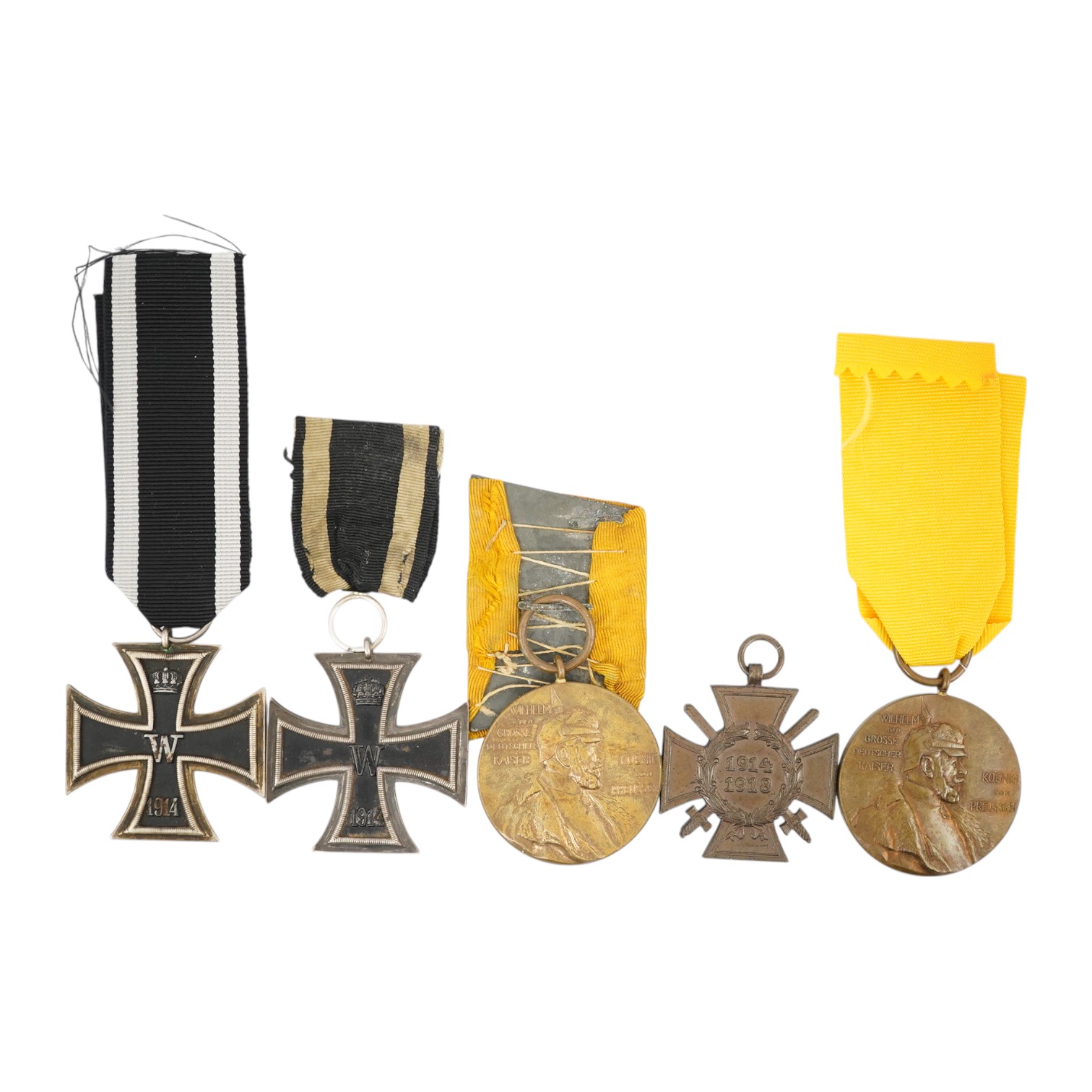 Five German WWI medals; two Second class Iron Crosses, two Kaiser Wilhelm Centenary medals and an Honour Cross 1914-1918. Condition - fair.